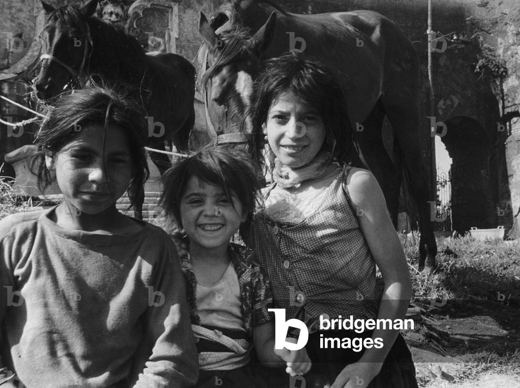Group of the gypsy in the area of Mandrione in Rome (b/w photo)