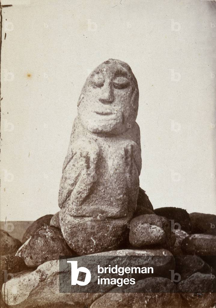 A souvenir of Odoardo Beccari's journeys: male figure carved in stone before Indian rule in Java, Indonesia