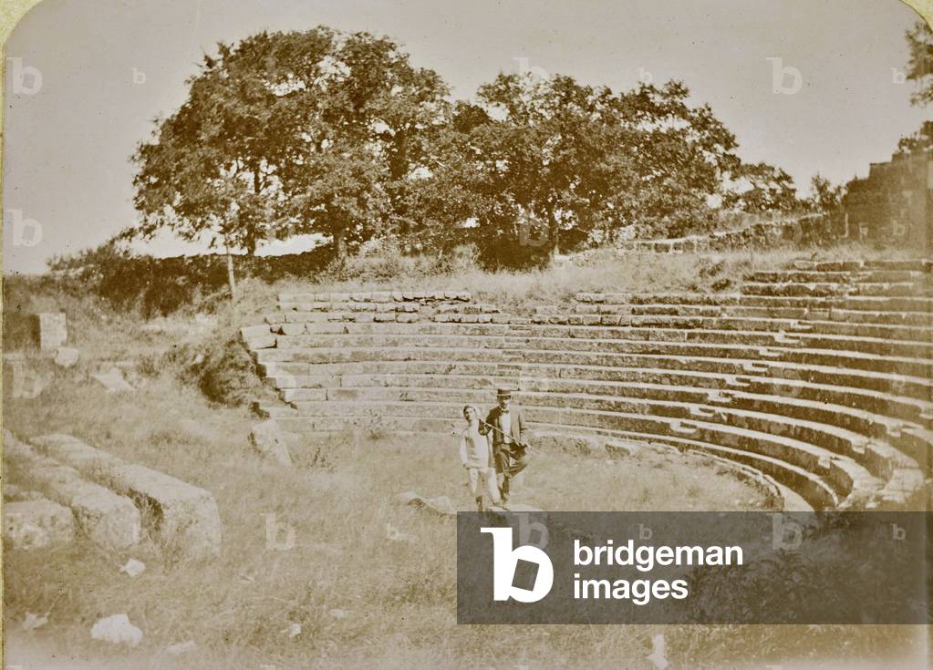 Two men portraits inside the remains of the theater of Tusculum