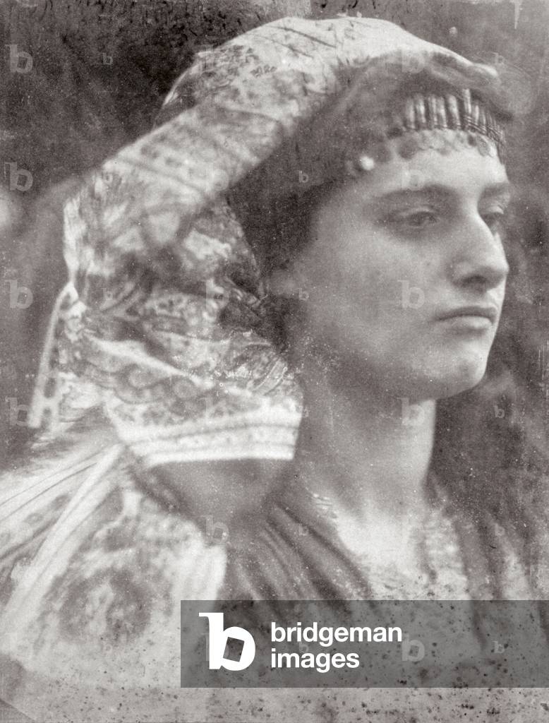 Half-length portrait of a young woman in three-quarter view. She is probably an actress and is dressed as Herodias