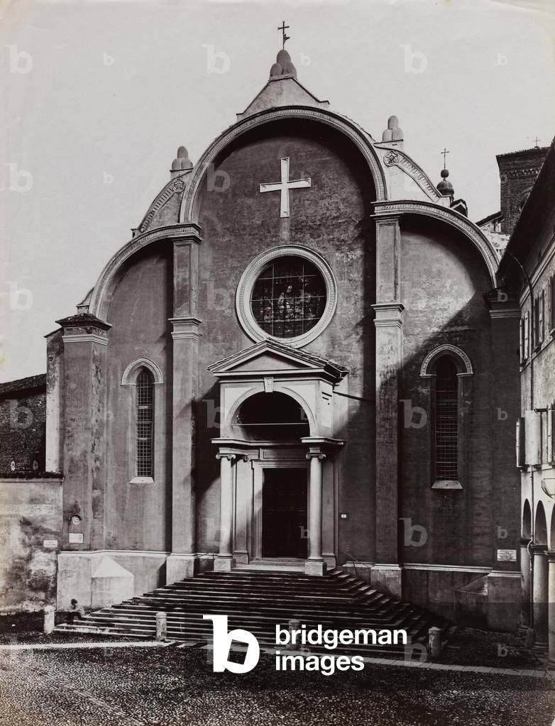 The facade of the Church of San Giovanni in Monte in the square of the same name in Bologna. In the foreground the staircase