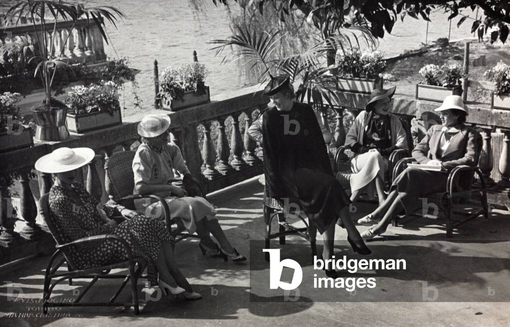 Models wearing articles created by the couture houses 