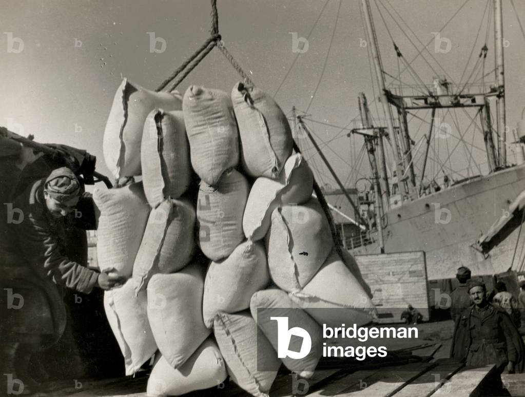 Foodstuffs & Munitions being unloaded in Naples Port from the Italian troops (b/w photo)