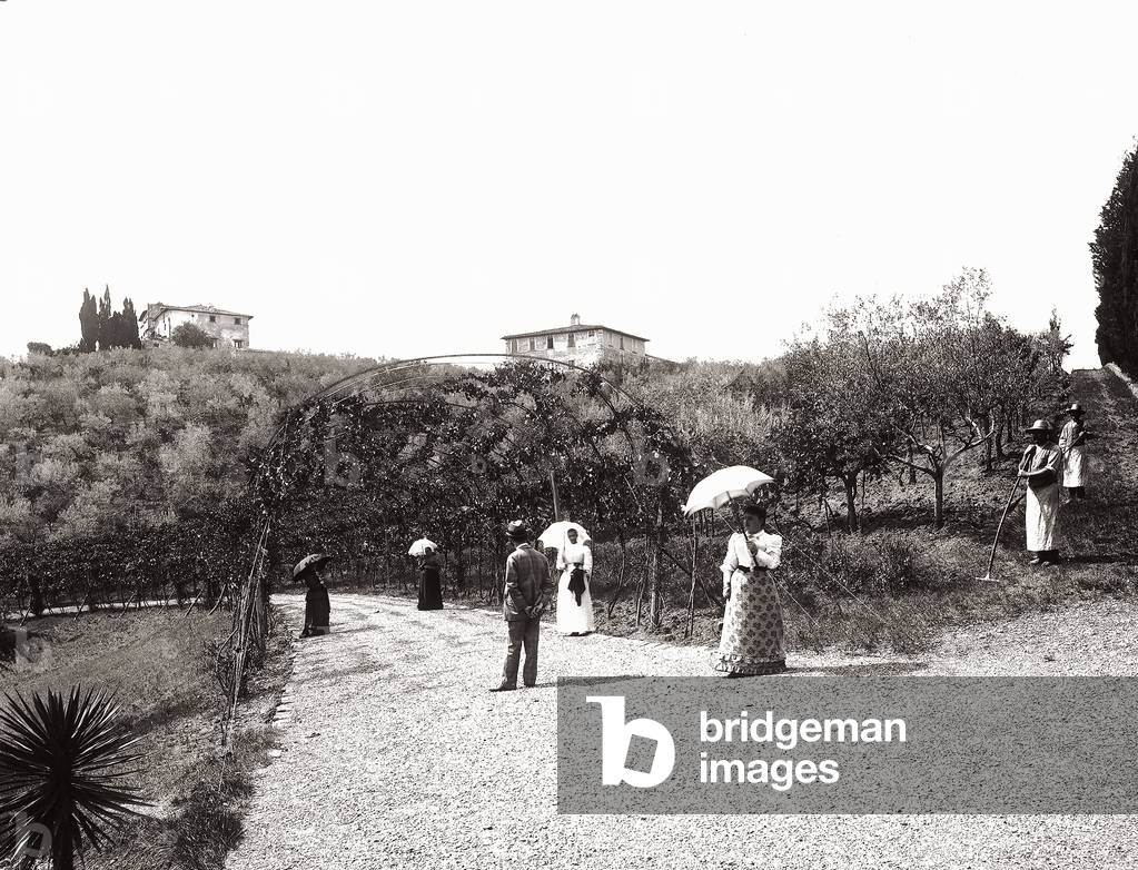 Strolling under the pergola, near the Villa of Sant'Andrea