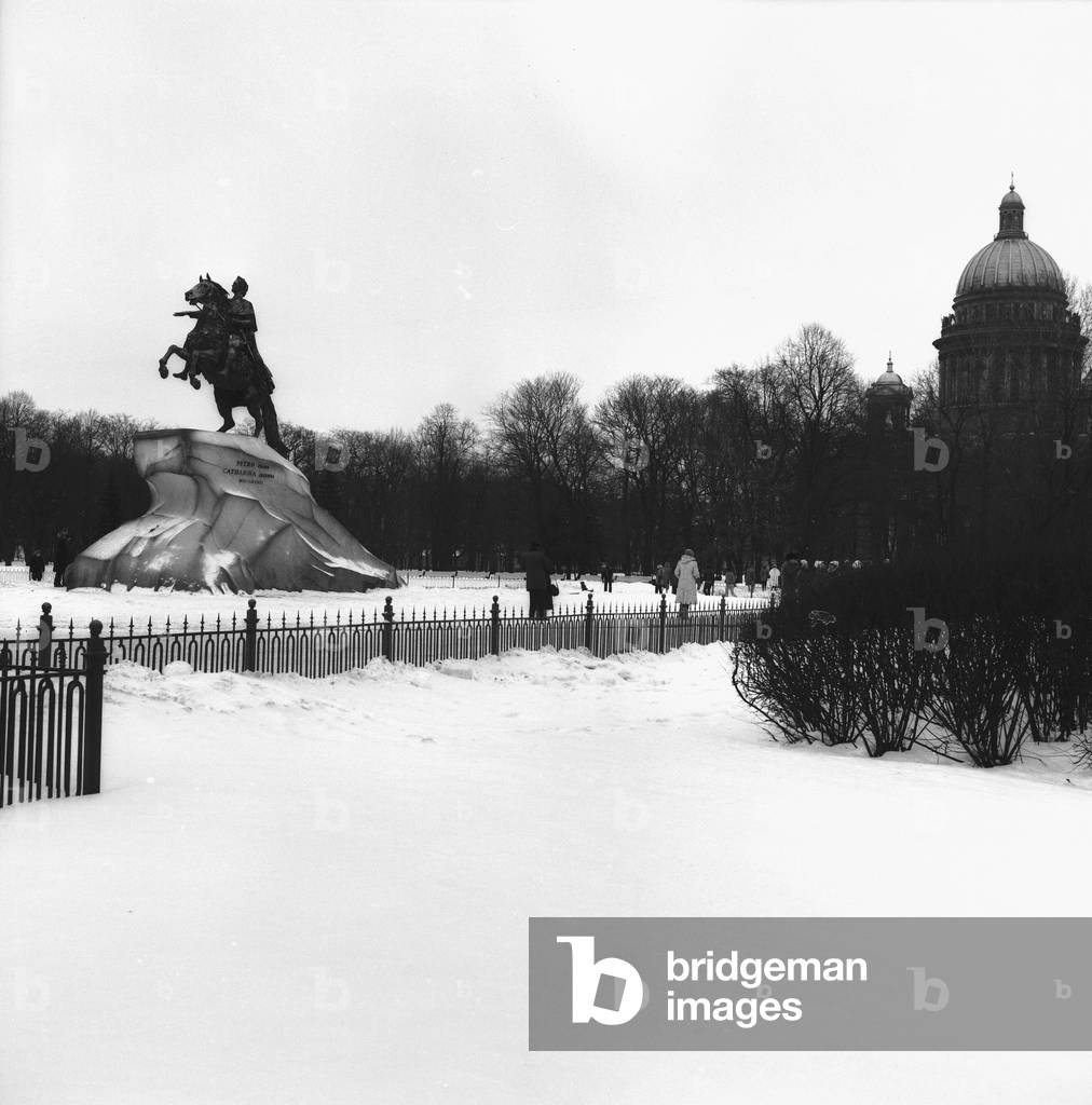 The equestrian statue of Peter the Great with snow in St. Petersburg (b/w photo)