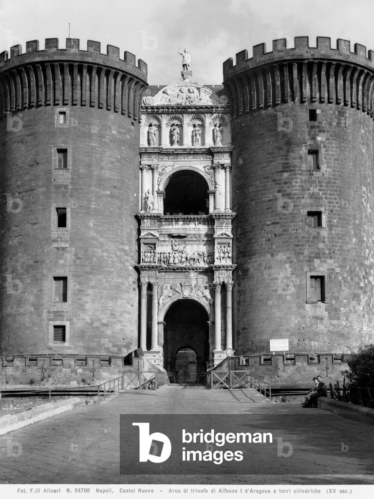 The famous Triumphal Arch, between the Torre di Guardia (guard tower) and the Torre di Mezzo (middle tower) of Castel Nuovo, also known as Maschio Angioino, in Naples
