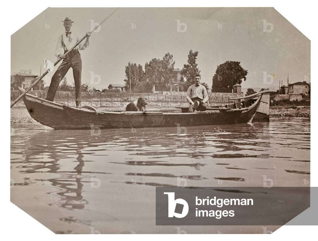 Pair of men on a boat on the Arno, Italy, 1900-10 (b/w photo)