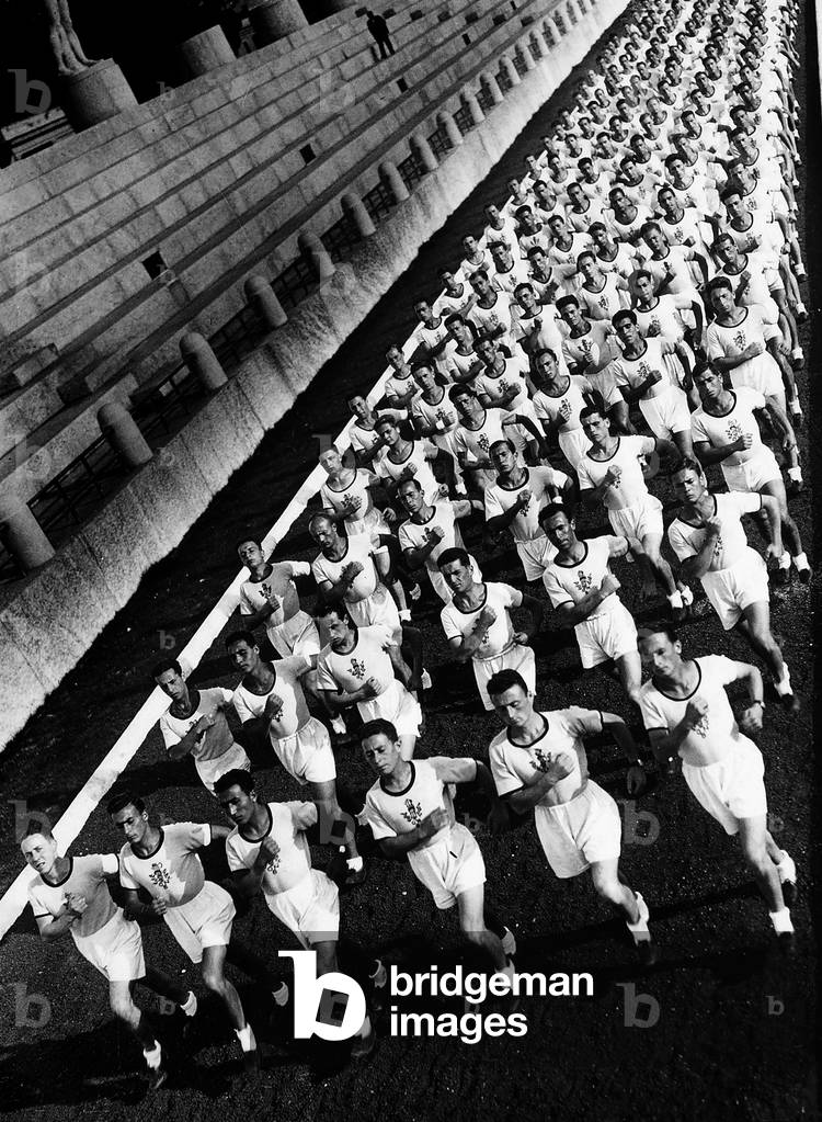 Athletes of the Fascist Academy during a track event at the Foro Mussolini, Rome (b/w photo)
