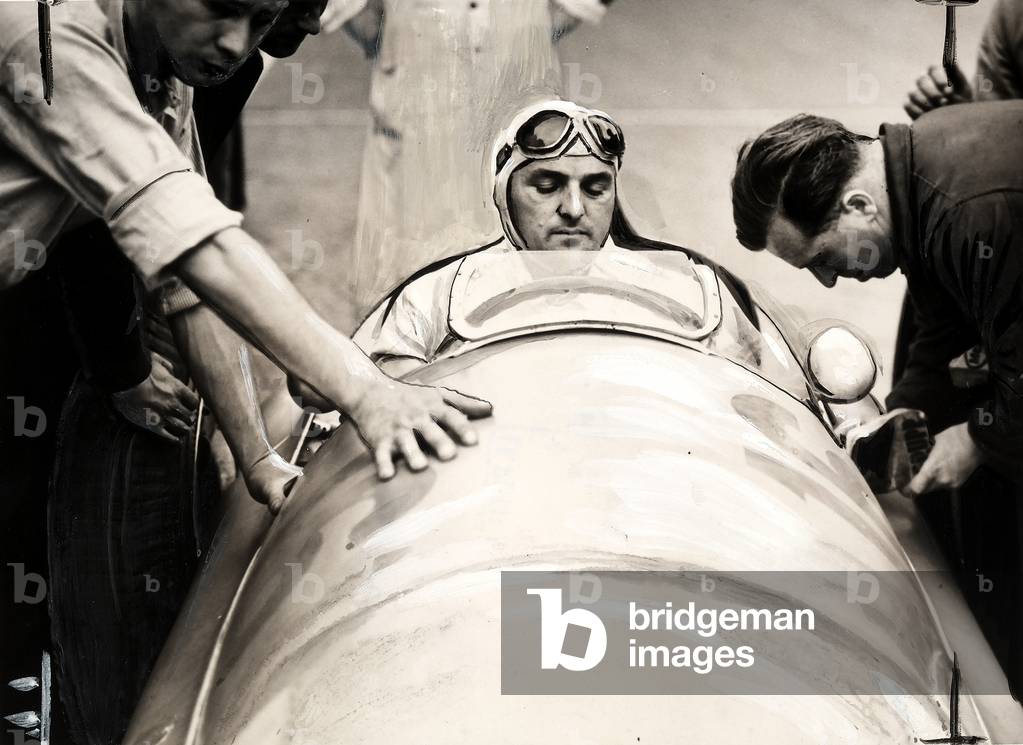 The German pilot Lang in a Mercedes model car at Switzerland's Grand Prix