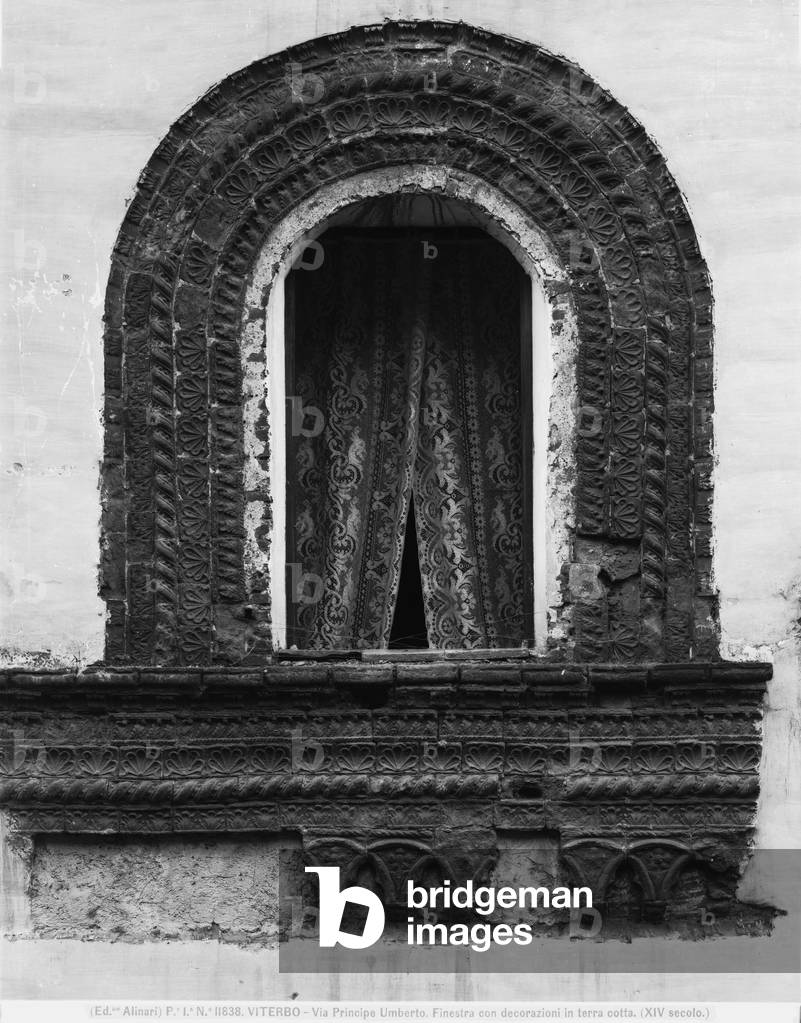 Window with terracotta frame, via Principe Umberto, Viterbo