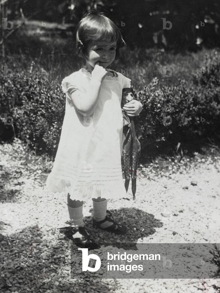 Portrait of a little girl in a garden; the support contains the indication 