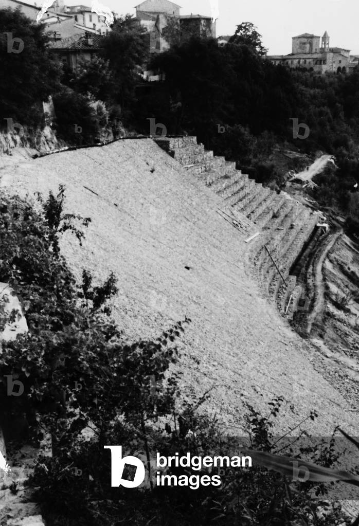 Some gabbions, made by Maccaferri Officine, Bologna, preventing boulders from falling