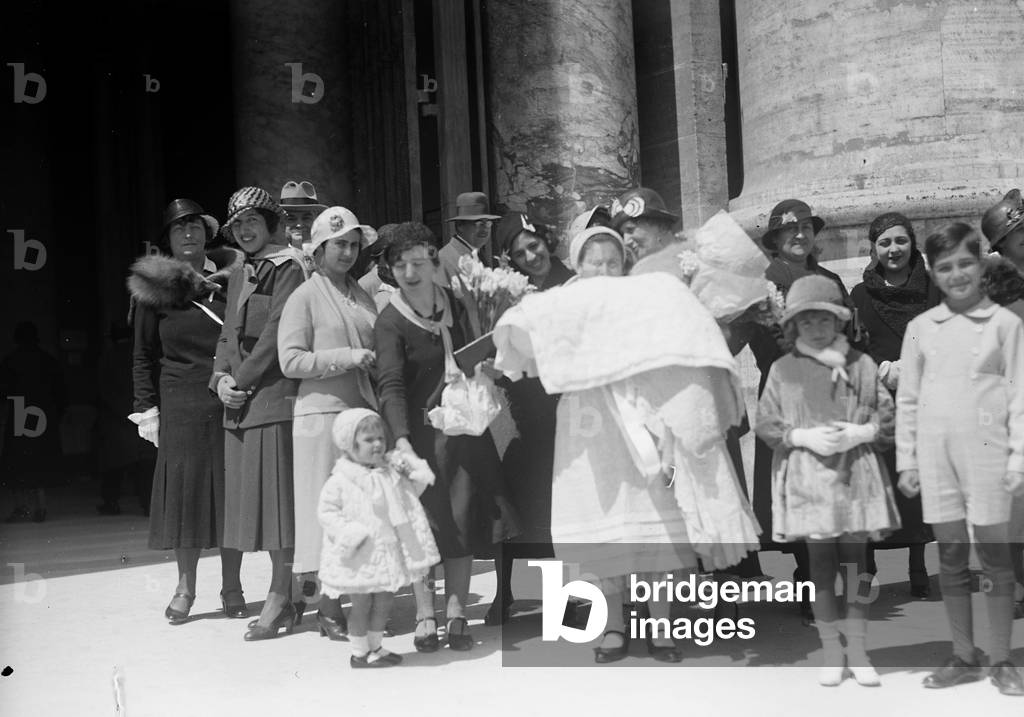 Group portrait in front of the entrance of St. Peter's Basilica in Rome