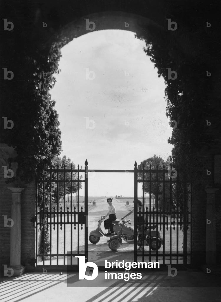 Italy, view of passers-by on a motorcycle, 1960 1970