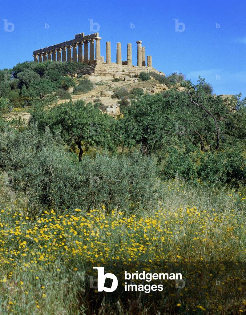 View of the Temple of Juno Lacinia in the Valley of the Temples in Agrigento, which is reached by going uphill. The Temple, situated on a hilltop, is reachable by a long path of stairs which can be seen in the photo.