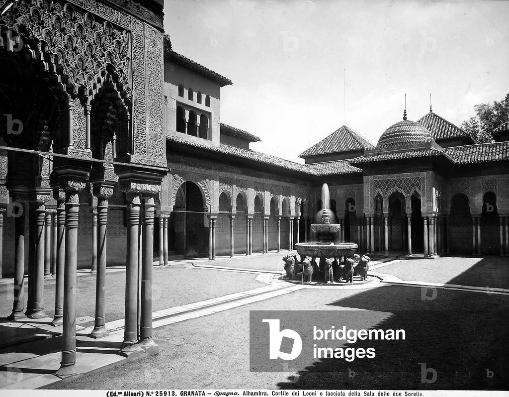 Courtyard of Lions and the façade of the Hall of the two Sisters in the Alhambra Palace, Granada.