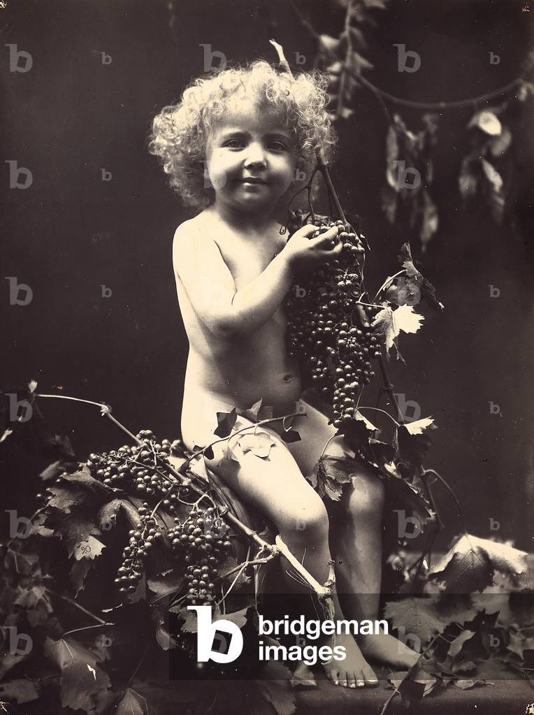 Portrait of a little boy dressed as Baby Bacchus