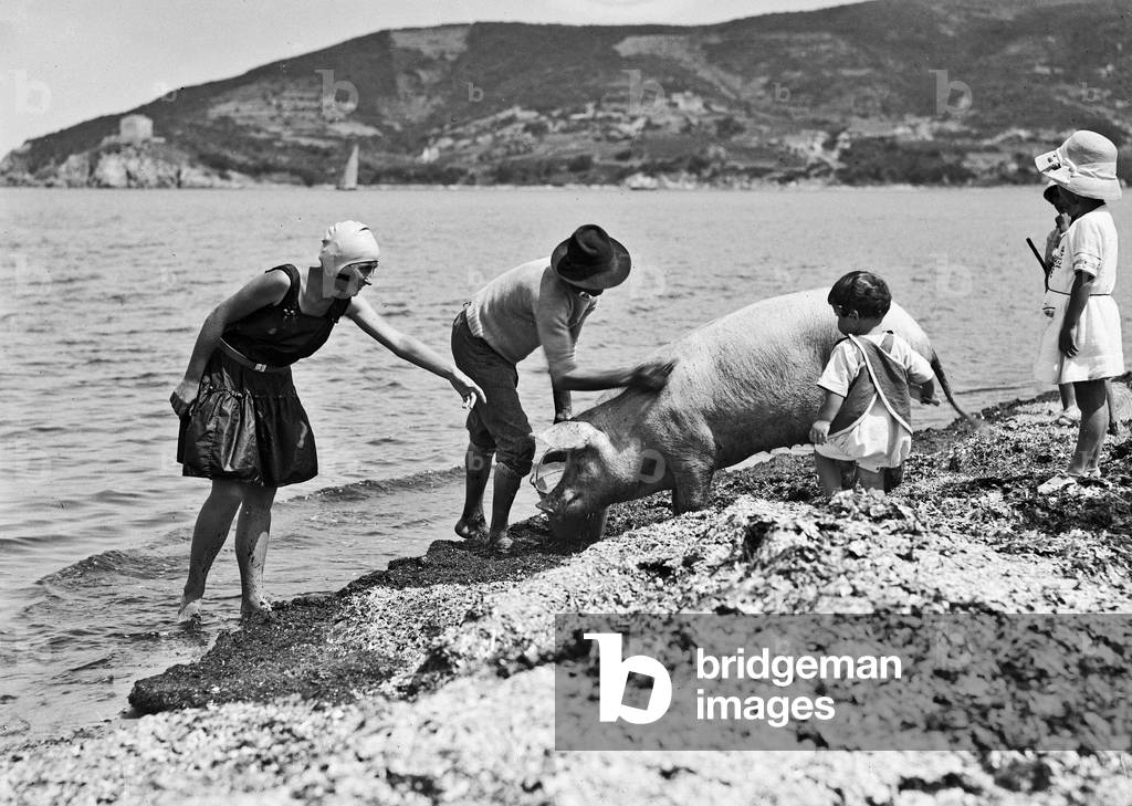 Bathers on the beach of Procchio, Elba Island