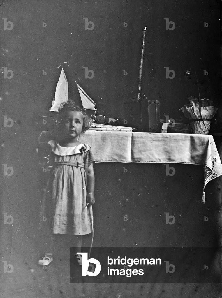 Portrait child near a table