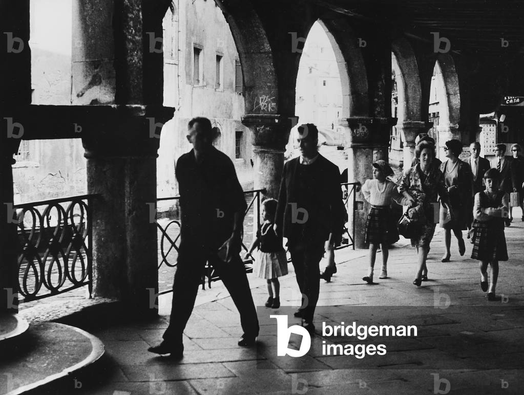 Group of people walking around Venice