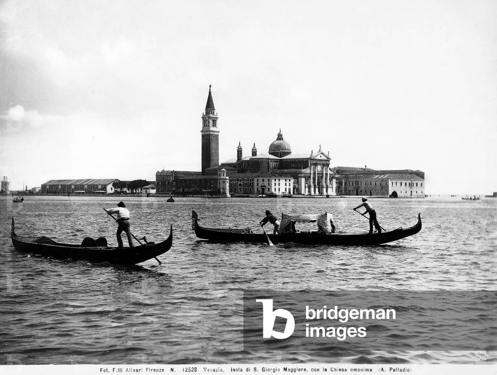Two gondolas in the Venice lagoon. In the background, the Island of San Giorgio Maggiore and the Church of San Giorgio Maggiore
