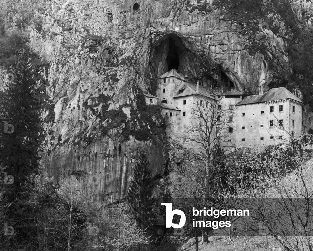 Predjama Castle in Slovenia (b/w photo)