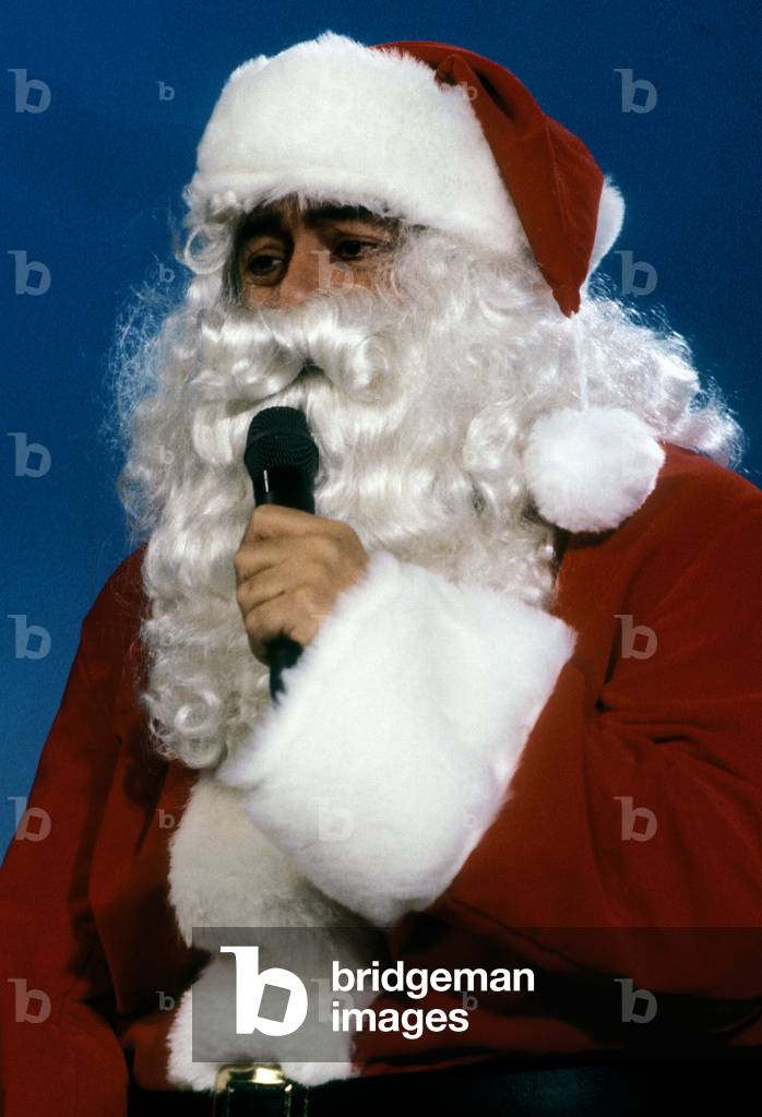 Luciano Pavarotti dressed as Santa Claus