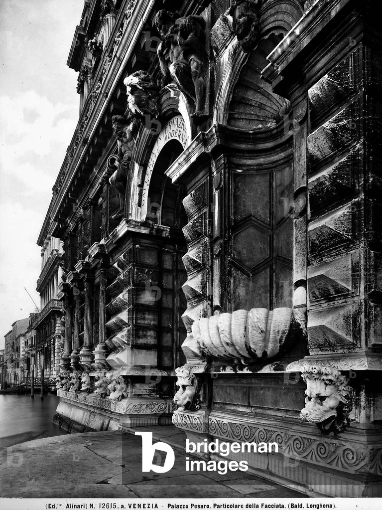 Detail of the façade of Ca' Pesaro, Venice. The richness of the sculpted elements creates a scenographic complex.