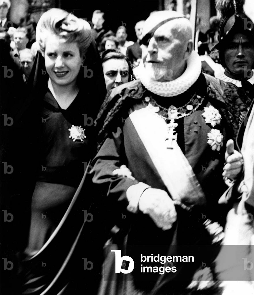 Eva Peron leaving St. Peter's Basilica where Pope Pius XII was giving a ceremony, Rome, 1947 (b/w photo)