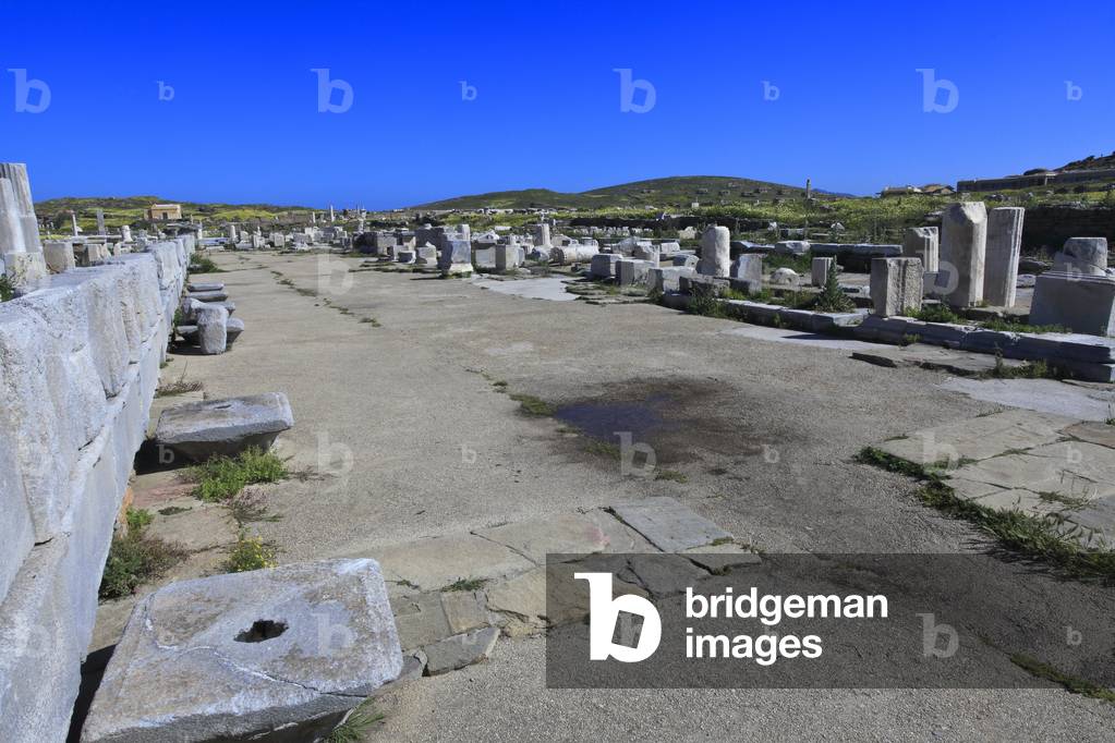 Archaeological site of Delos. The sacred way: a wide road leading to the sanctuary of Apollo. 2nd Century BC.