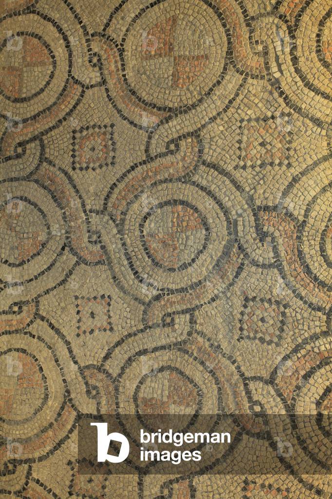Byzantine Mosaic with geometrical patterns, from the new monument discovered over the last few decades in Ravenna : The Domus of Stone Carpets. These mosaics were part of a byzantine palace from the 6th century. Ravenna, Italy -