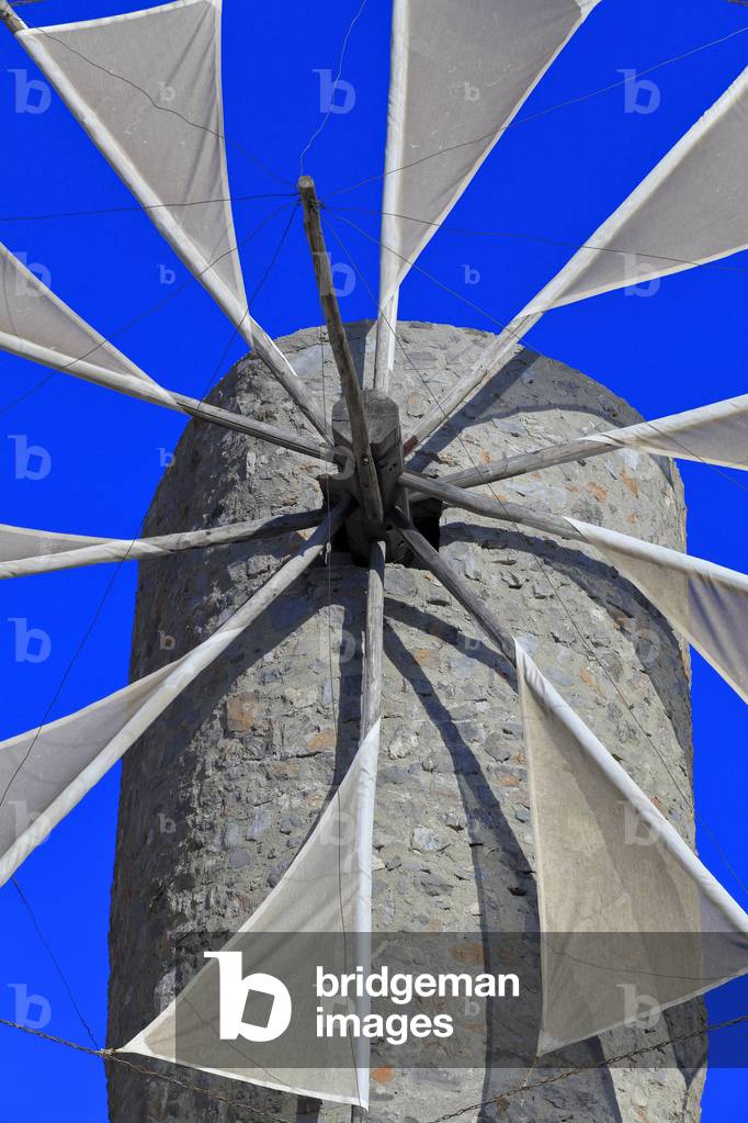 Traditional stone windmills dating back to the 1800s. Lassithi Plateau. The Lasithi Plateau, Seli Ambelou, Crete, Greece.