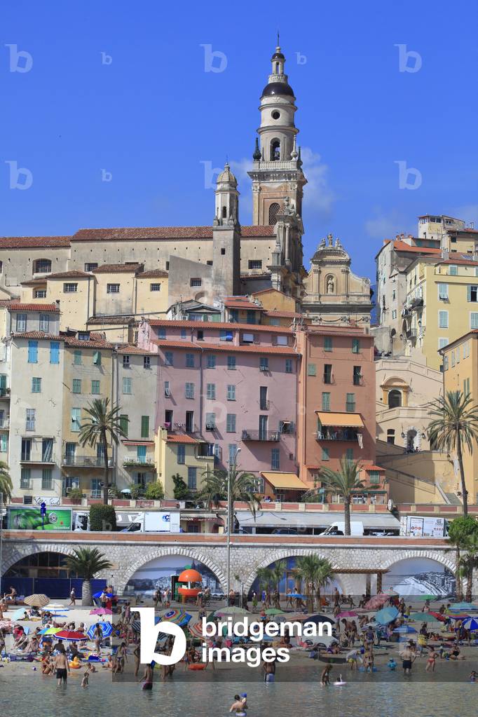 Old town in Menton and the beach 