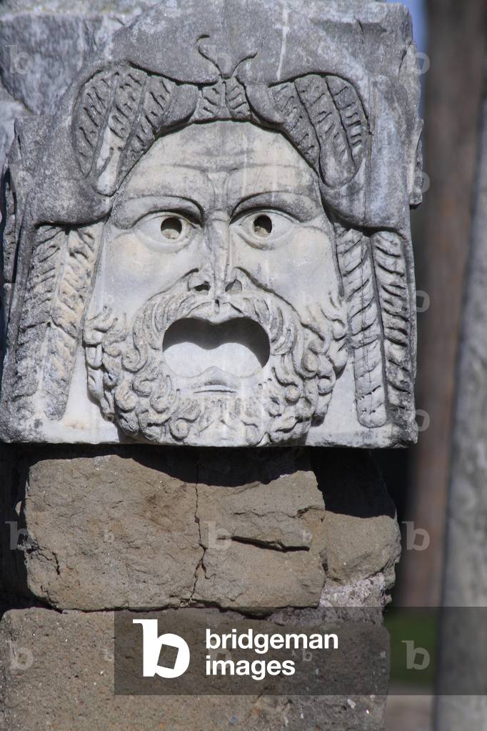Theatre Mask/Sculpture on the scene wall (disappeared)/Ostia/Rome/Italy