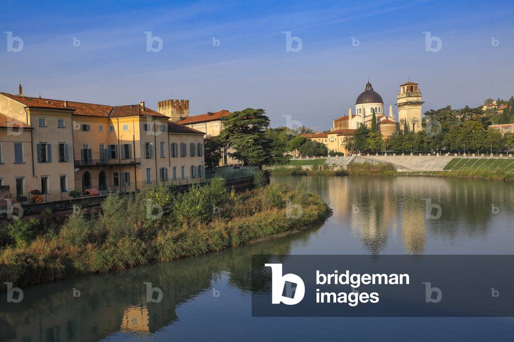 Houses of the old town on the banks of the Adige river