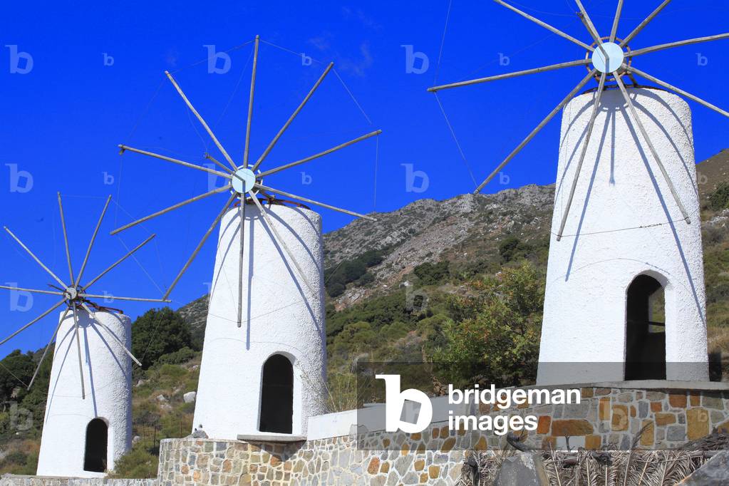 Traditional windmills in the Lassithi plateau, The Lasithi Plateau, Crete, Greece.