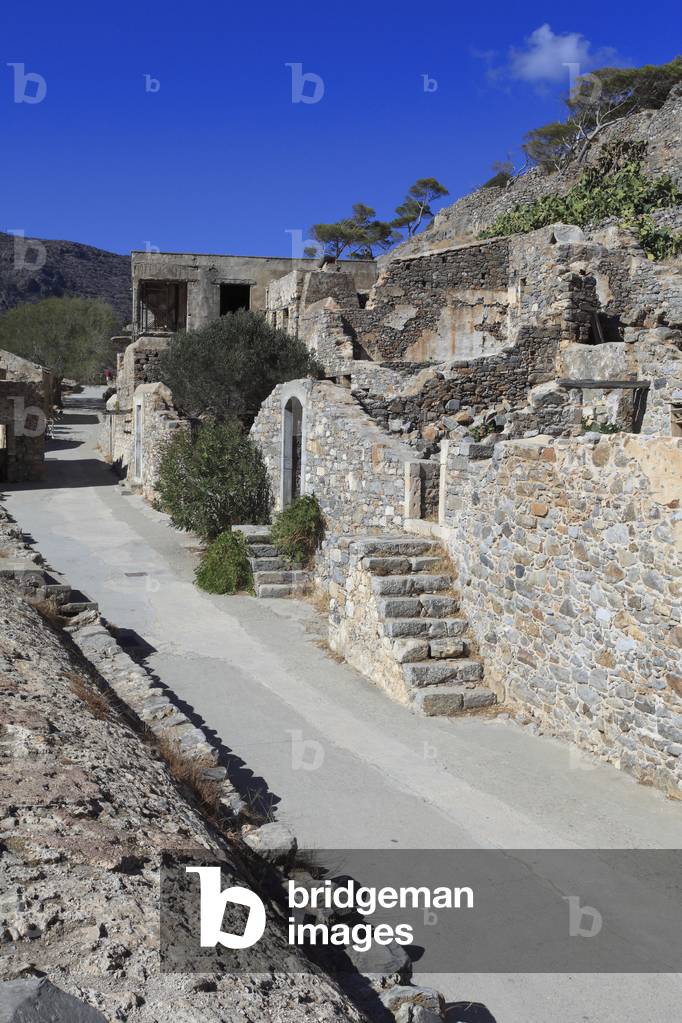 Spninalonga Island. The residences of the Ottoman Period  in front of the cisterns of the Venitian period.