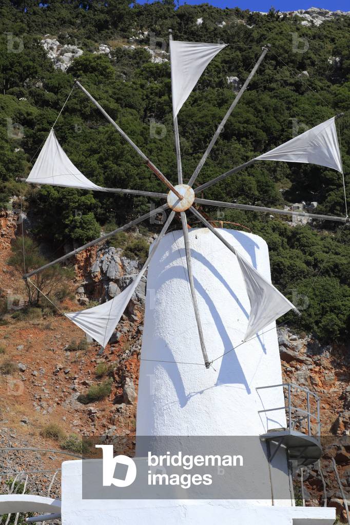 Traditional windmills in the Lassithi plateau, The Lasithi Plateau, Crete, Greece.