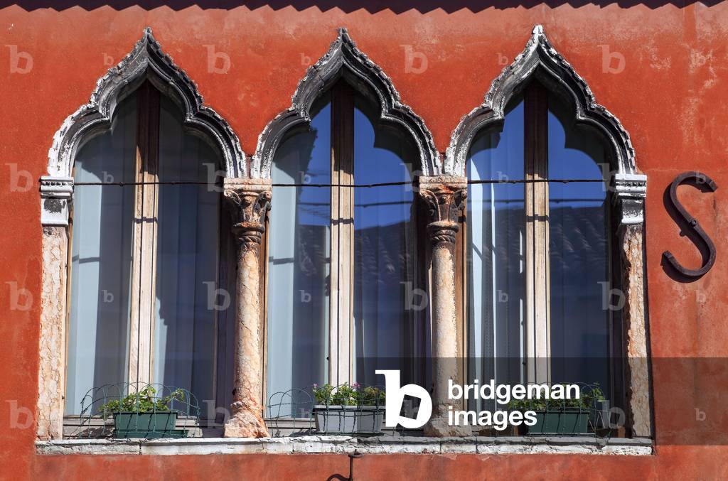 Windows in old gothic venetian style. Murano