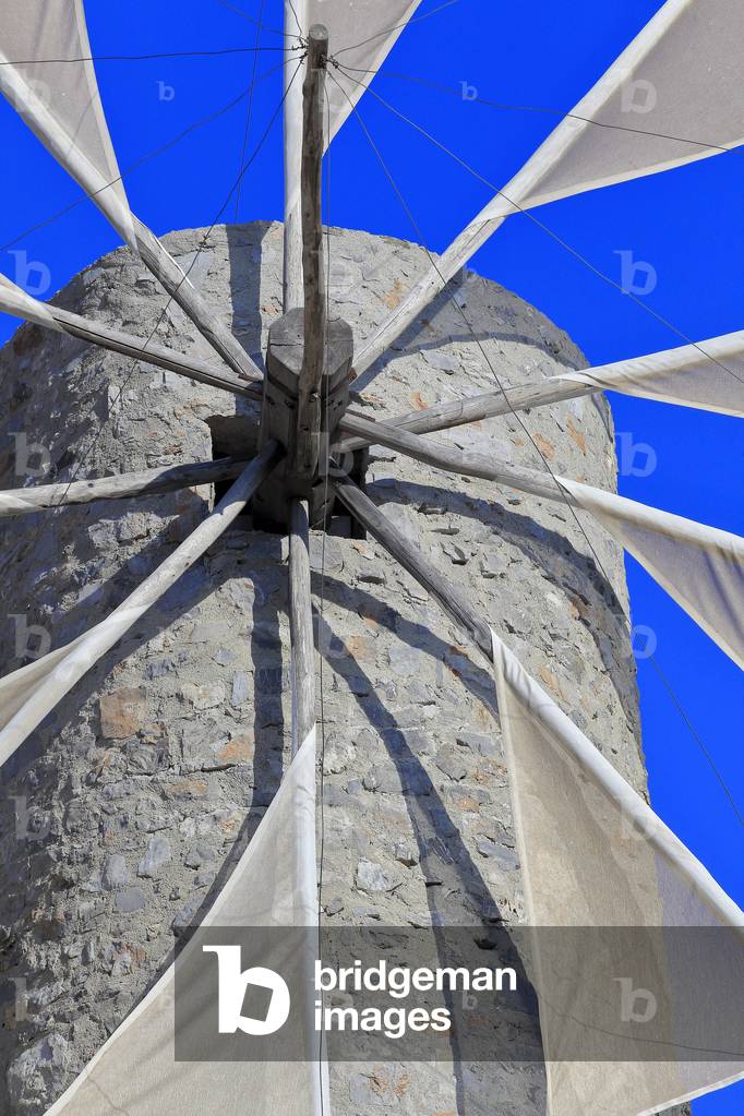 Traditional stone windmills dating back to the 1800s. Lassithi Plateau. The Lasithi Plateau, Seli Ambelou, Crete, Greece.