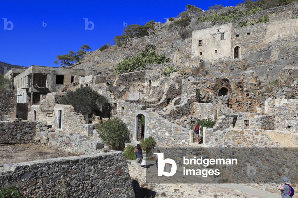 Spninalonga Island. The residences of the Ottoman Period  in front of the cisterns of the Venitian period.