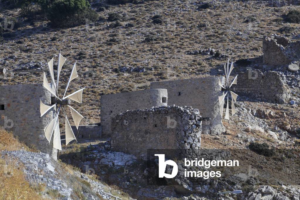 Traditional stone windmills dating back to the 1800s. Lassithi Plateau. The Lasithi Plateau, Seli Ambelou, Crete, Greece.