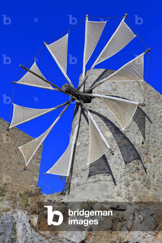 Traditional stone windmills dating back to the 1800s. Lassithi Plateau. The Lasithi Plateau, Seli Ambelou, Crete, Greece.
