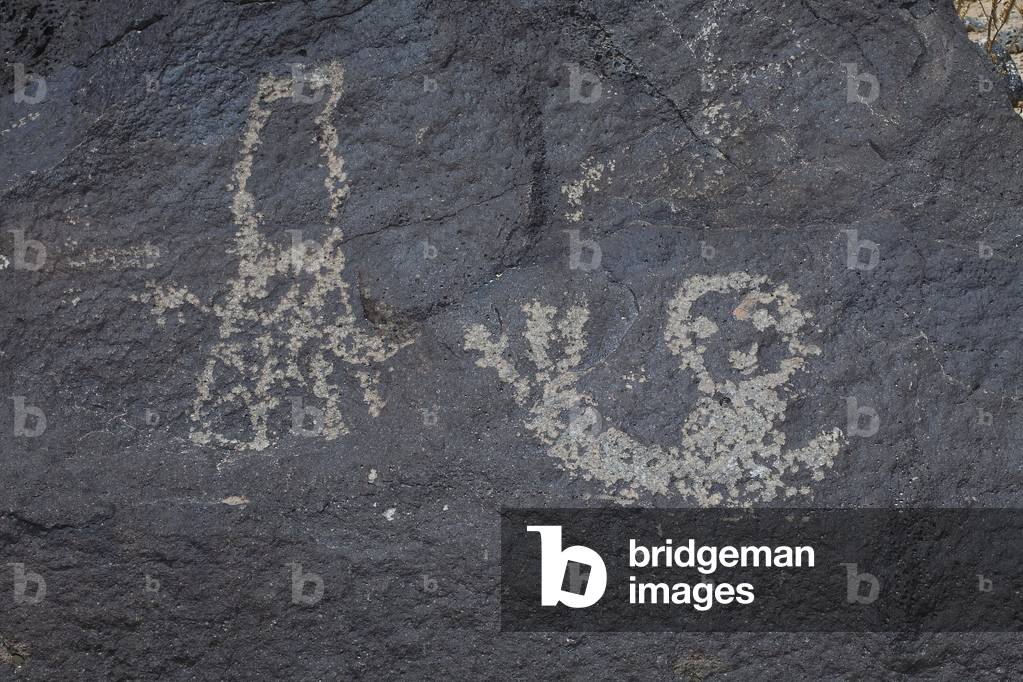 Indian Petroglyphs representing a child - Petroglyph National Monument - Albuquerque, New Mexico, USA (USA)