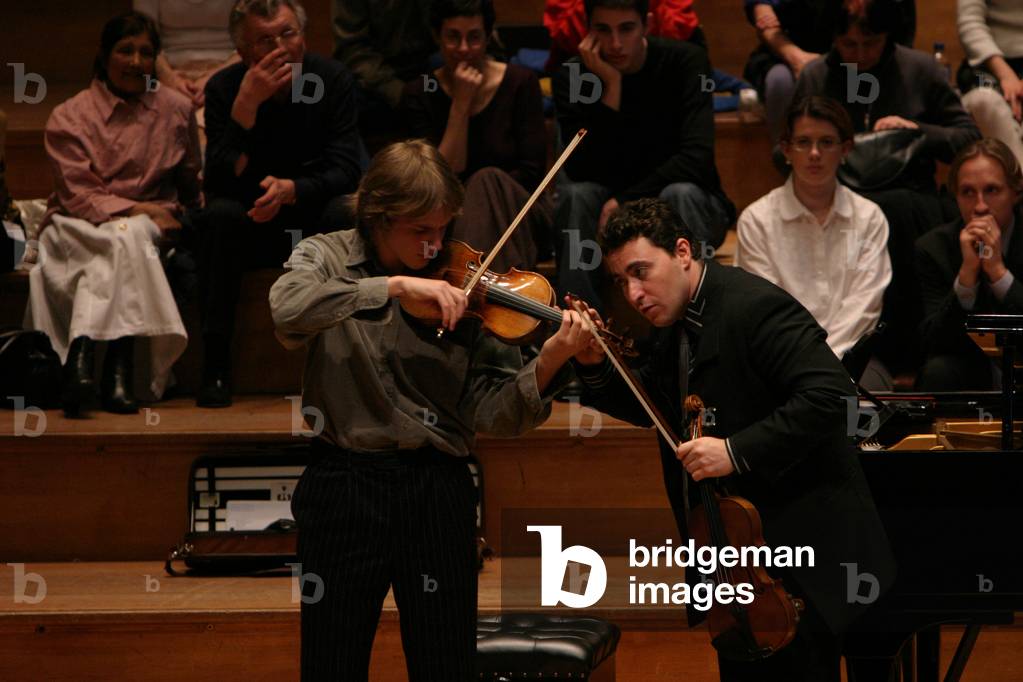 Maxim Vengerov listening to student play violin during his masterclass, Duke's Hall, Royal Academy of Music, London, 1 April 2004