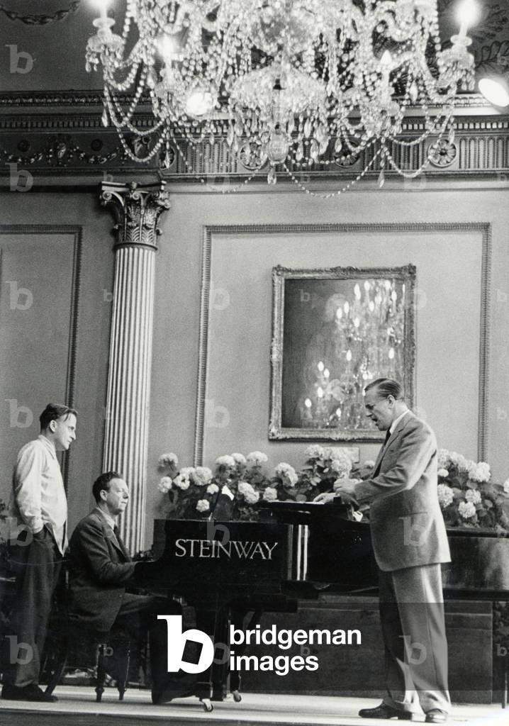 BRITTEN, Benjamin - playing the piano - c1957 accompanying Peter PEARS singing