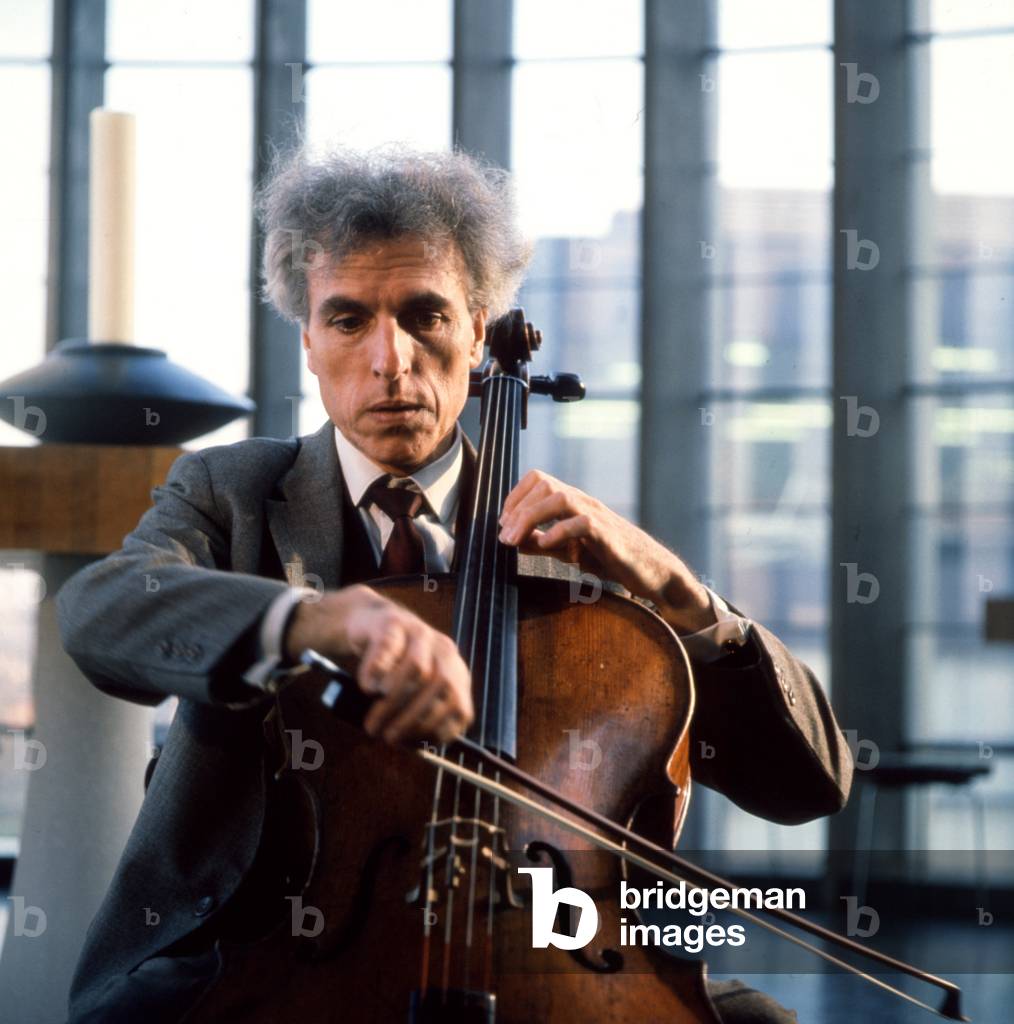 TORTELIER, P- playing cello in Coventry Cathedral 1962 by David Farrell French cellist and composer b