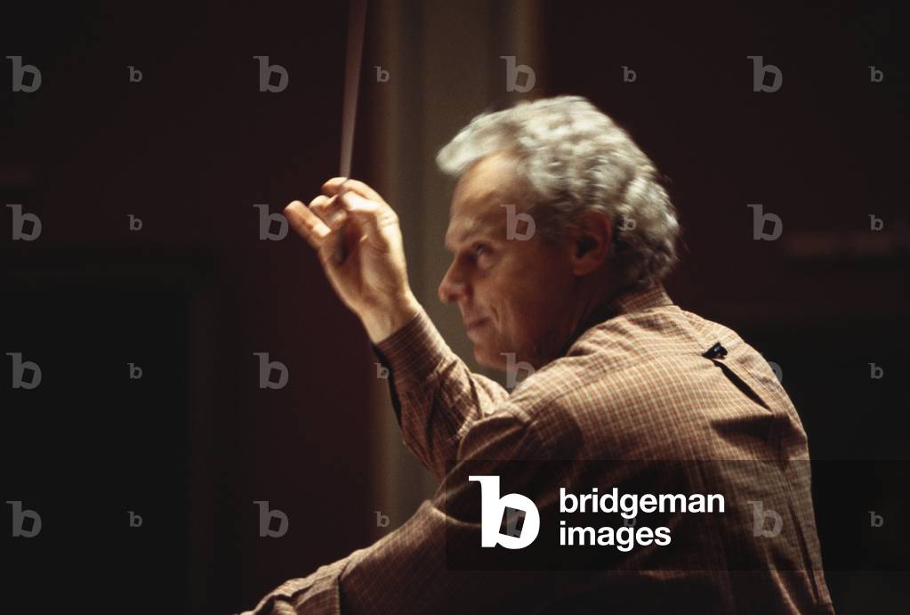 Jan-Pascal (or Yan Pascal) Tortelier - portrait of the French conductor and violinist, conducting with baton