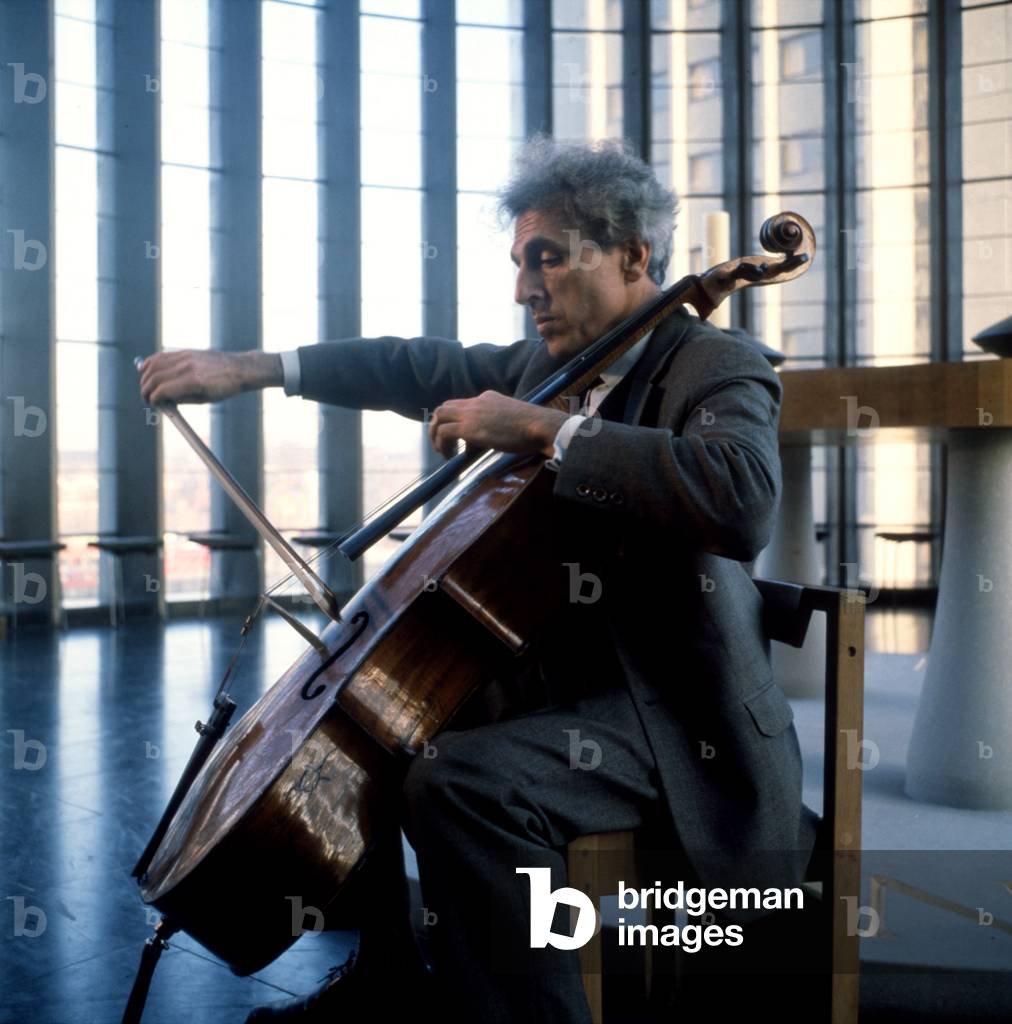 TORTELIER, P- playing cello in Coventry Cathedral 1962 by David Farrell French cellist and composer b