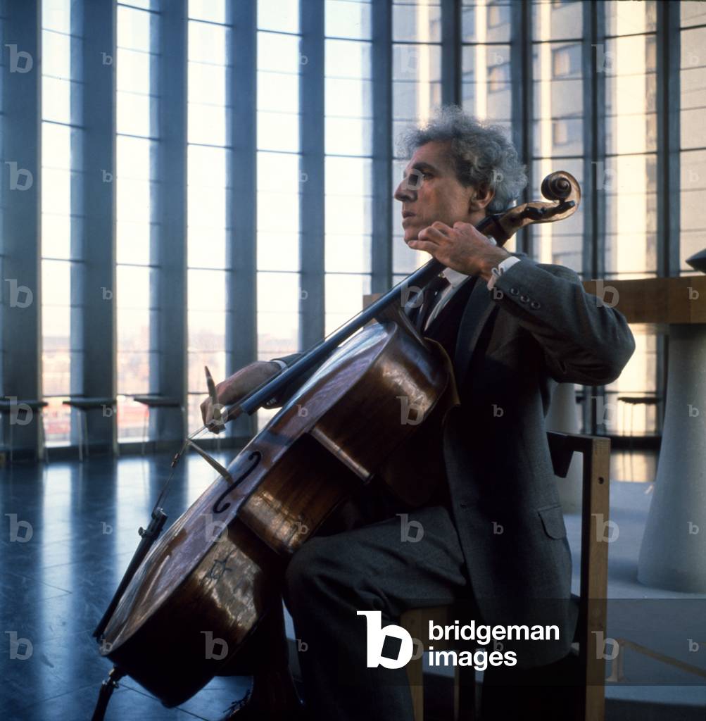 TORTELIER, P- playing cello in Coventry Cathedral 1962 by David Farrell French cellist and composer b